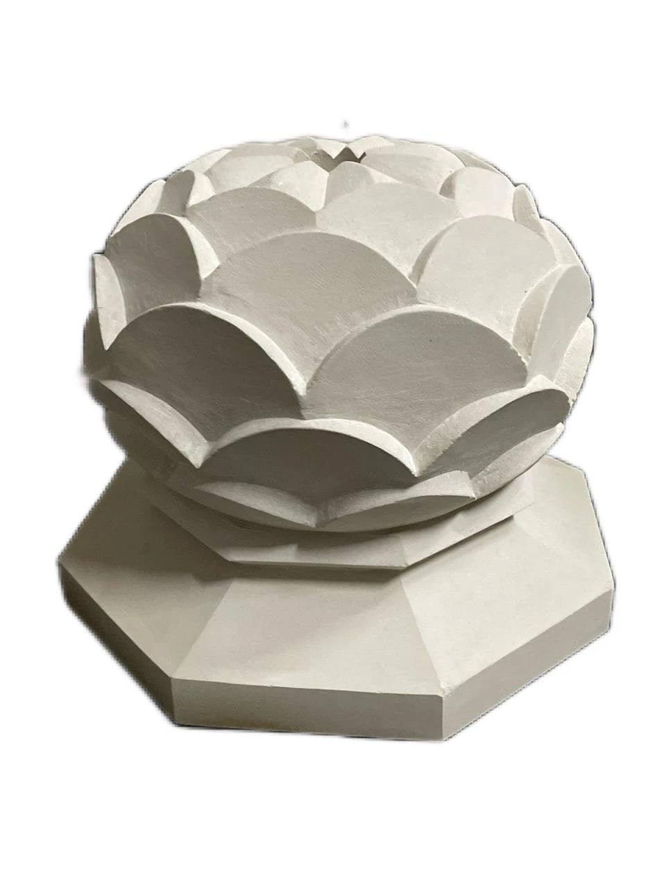 Hand-carved octagonal lotus sandstone parasol base in a garden